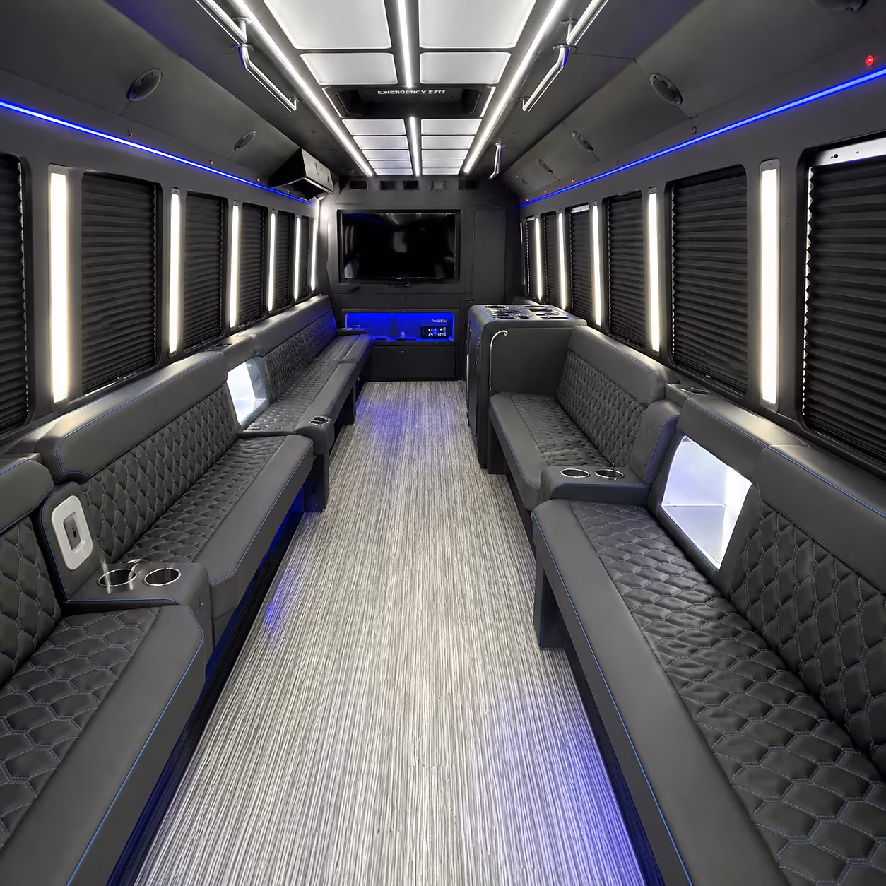 Friends laughing during a party bus celebration in Coral Springs
