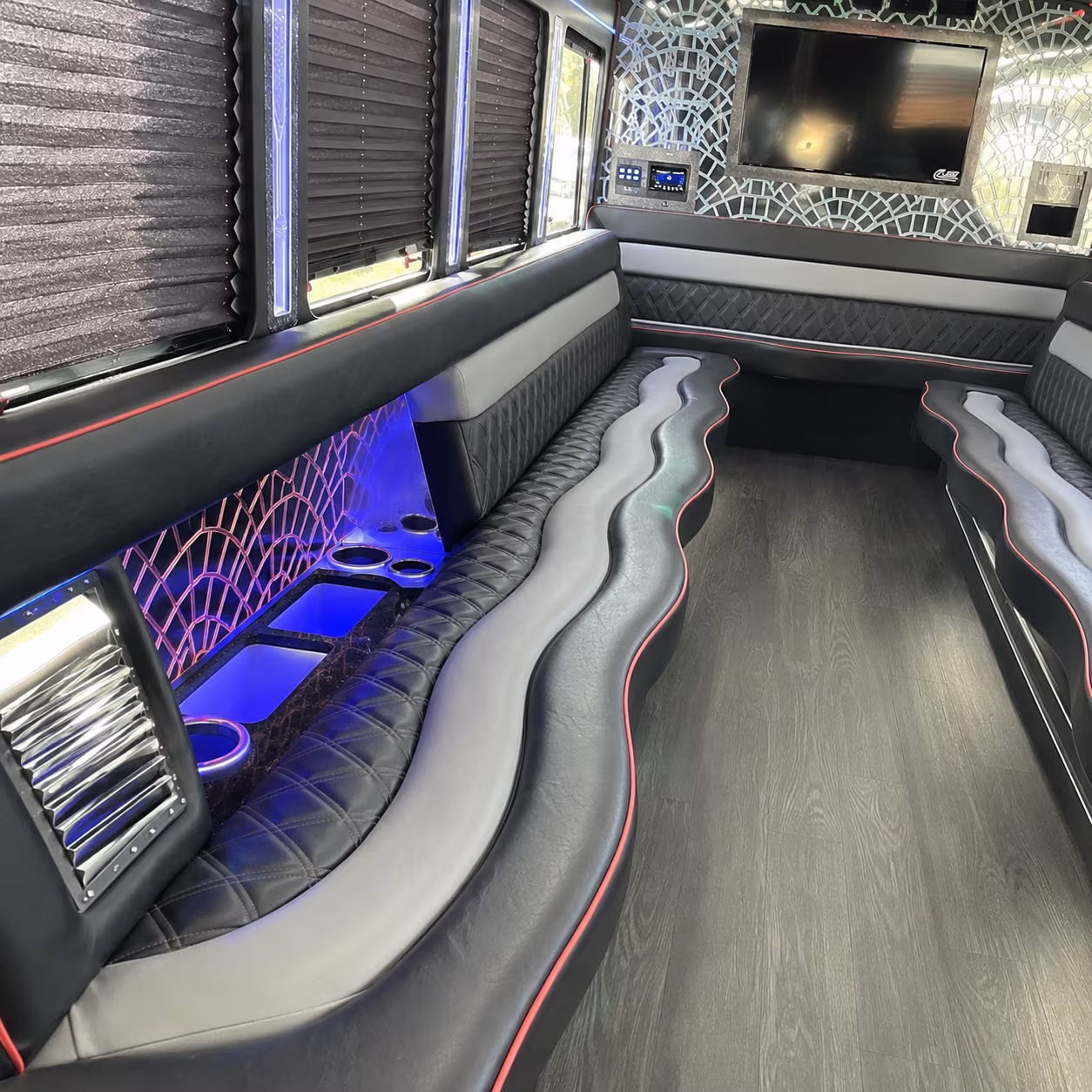 Group beside a Mercedes Sprinter limo in Coral Springs